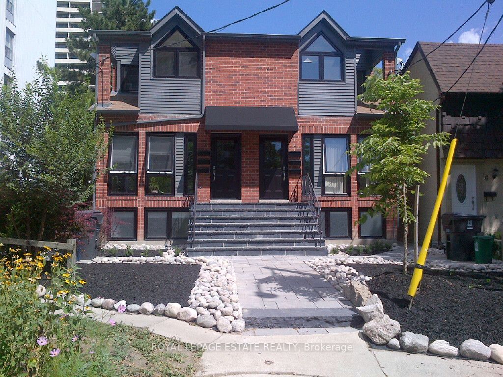 Multiplex house for sale at 12-14 Dartford Rd Toronto Ontario